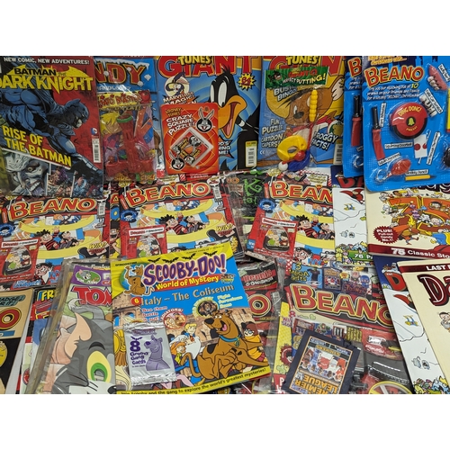 560 - A quantity of Beano, Dandy, Looney Tunes, Batman Scooby-Doo magazines, etc.