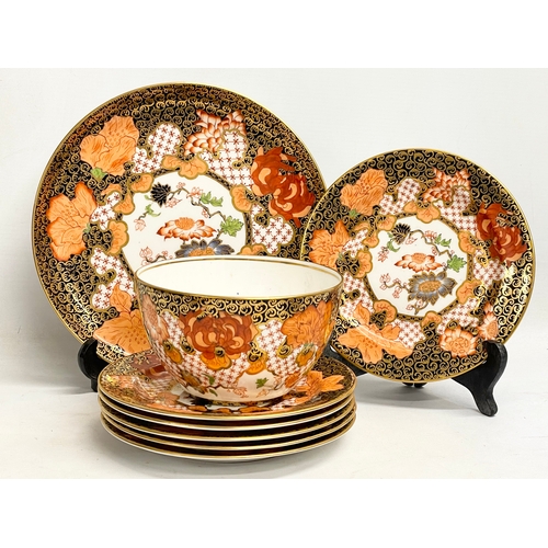 634 - A 20 piece Royal Crown Derby Imari pattern porcelain tea set. Largest plate measures 23.5cm. Sugar b... 