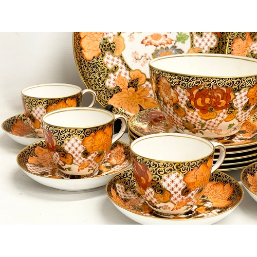 634 - A 20 piece Royal Crown Derby Imari pattern porcelain tea set. Largest plate measures 23.5cm. Sugar b... 