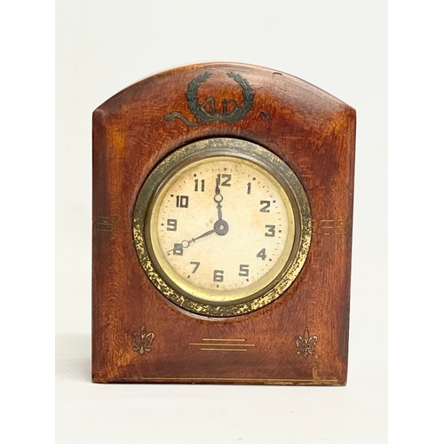 158 - An early 20th century inlaid windup mantle clock. 9.5x12cm