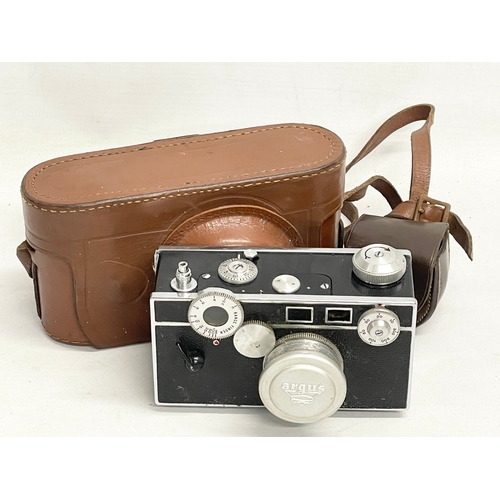 564 - An Argus C3 ‘The Brick’ Rangefinder camera with case.