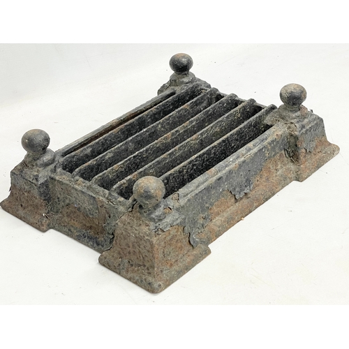 62 - A Victorian cast iron boot scraper. 35.5x28x10.5cm