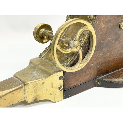 93 - A 19th century brass mechanical bellows. 68cm.