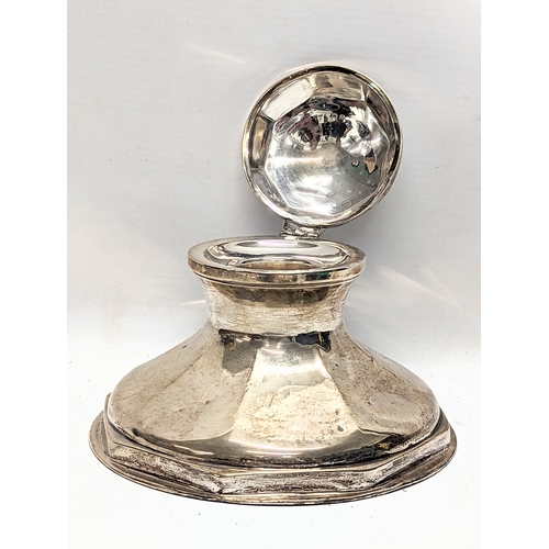 759 - A large silver inkwell. 15.5x11cm