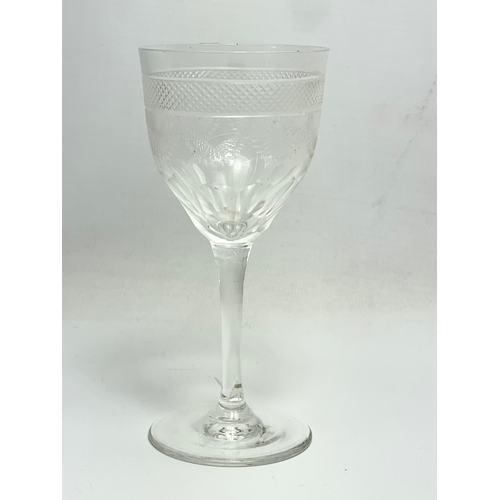 671 - A set of 10 early 20th century etched stemmed drinking glasses. 12.5cm