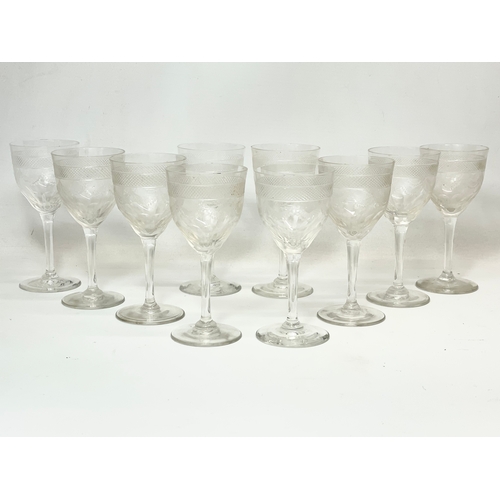 671 - A set of 10 early 20th century etched stemmed drinking glasses. 12.5cm