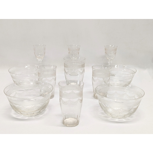 672 - 11 pieces of early 20th century etched drinking glasses.