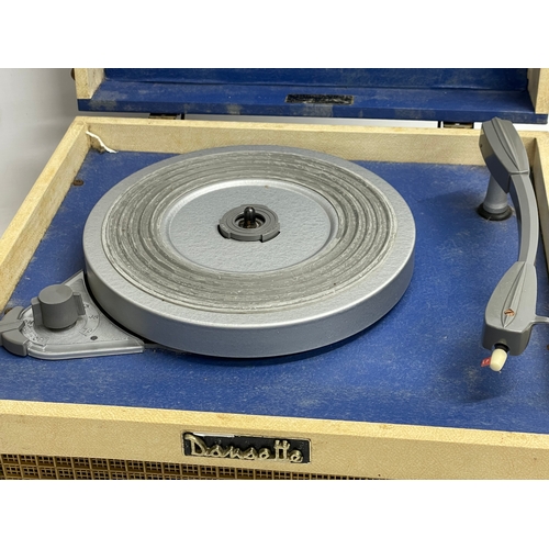 565 - A vintage Dansette record player. 34x31.5x18.5cm