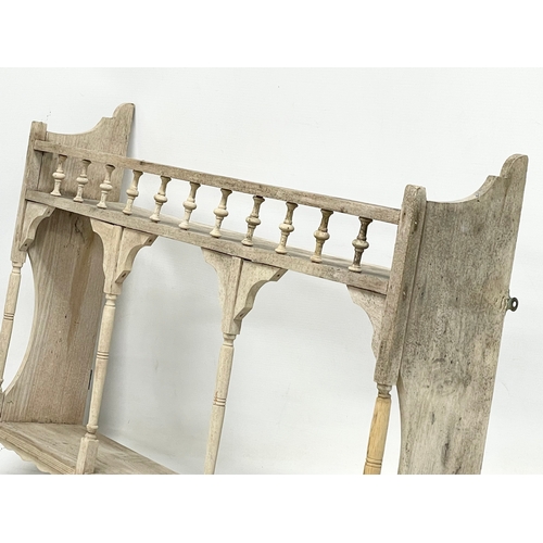 170 - An Edwardian wall bracket. 73.5x13.5x49cm