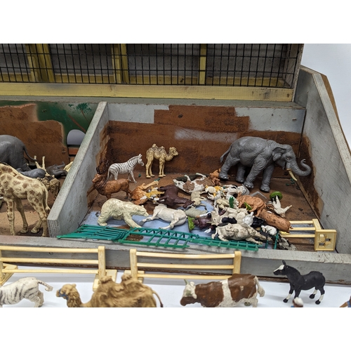 566 - A collection of mostly vintage Britains Ltd farm animals, zoo animals, etc with Zoo model set. Set m... 