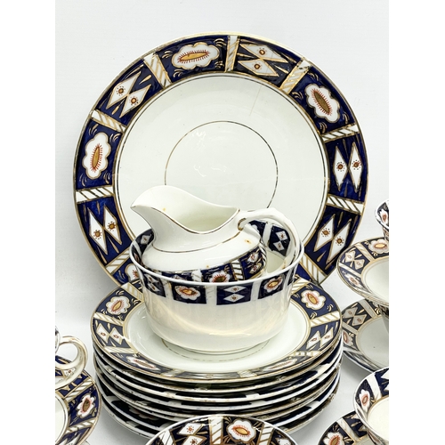 638 - A 64 piece Victorian Diamond China Imari pattern tea and coffee set.