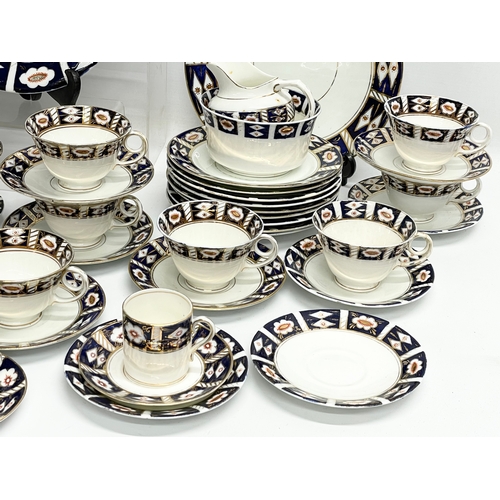 638 - A 64 piece Victorian Diamond China Imari pattern tea and coffee set.