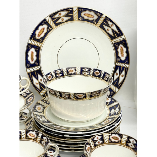 638 - A 64 piece Victorian Diamond China Imari pattern tea and coffee set.