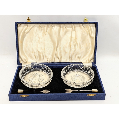 777 - A pair of vintage crystal Bon Bon dishes with sterling silver forks in case. Case measures 26.5x14.5... 