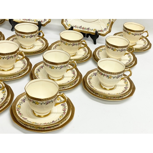 639 - A vintage 38 piece Tuscan China ‘Plant’ pattern tea set.