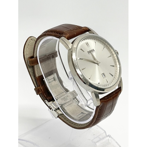 764 - A gents Hugo Boss watch with a Citizen leather strap.