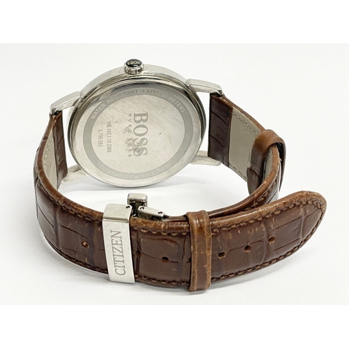 764 - A gents Hugo Boss watch with a Citizen leather strap.