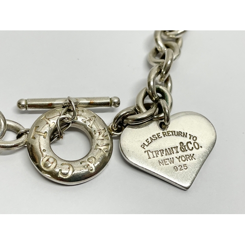 765 - A Tiffany & Co heavy 925 silver necklace. 64.96 grams.