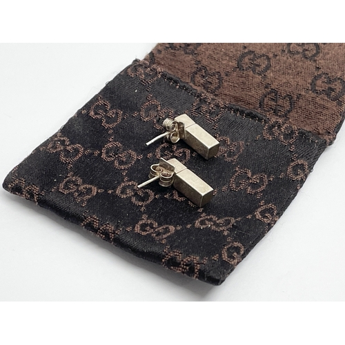 766 - A pair of ladies Gucci earrings with pouch.