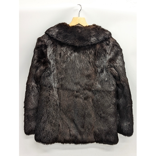 770 - A ladies fur coat.