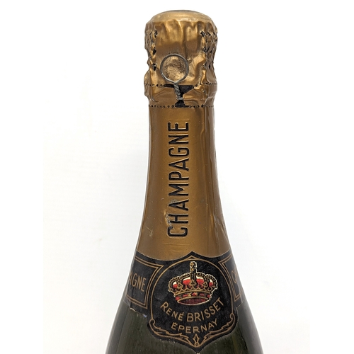 331 - An unopened bottle of René Brisset Cuvee Royale Champagne, 1969.