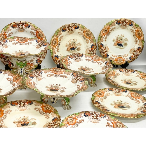 627 - 17 pieces of late 19th century porcelain dinnerware by Samuel Radford. Circa 1891-1913. 5 comports a... 