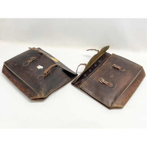 490 - 2 early 20th century leather satchels. 35cm.