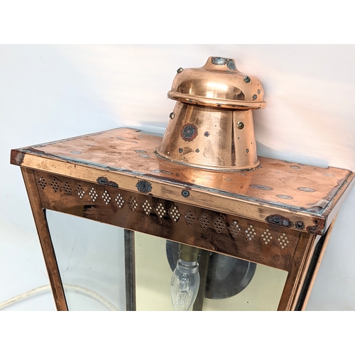 342 - A Victorian style copper wall light. 33x58cm