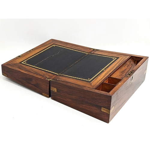 348 - A Victorian mahogany brass bound writing slope. 30.5x22.5x15cm