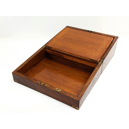 348 - A Victorian mahogany brass bound writing slope. 30.5x22.5x15cm