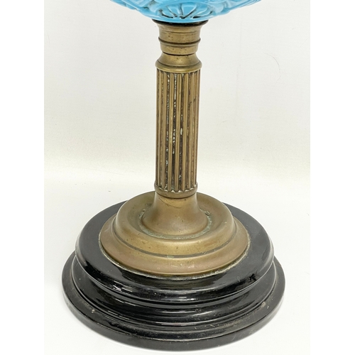 353 - A Victorian oil lamp. 43cm.