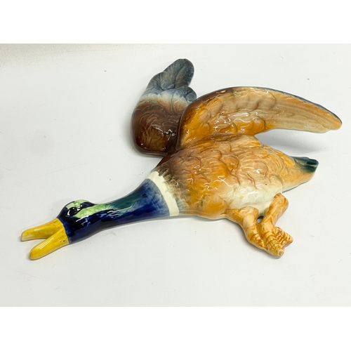 680 - A set of 3 vintage pottery birds by Falcon Ware. Largest measures 31x25cm