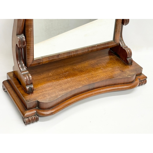 356 - A Victorian mahogany dressing mirror. 60x26x69cm.