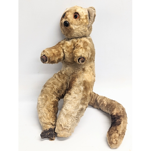 577 - 4 vintage soft toys including a 'Bush Baby' by Chad Valley. Largest measures 40cm