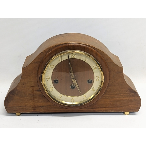 358 - A vintage walnut mantle clock, West Germany. 34.5x20cm