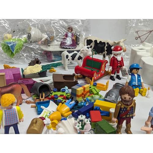 581 - A quantity of Playmobil toy figures and accessories, etc.