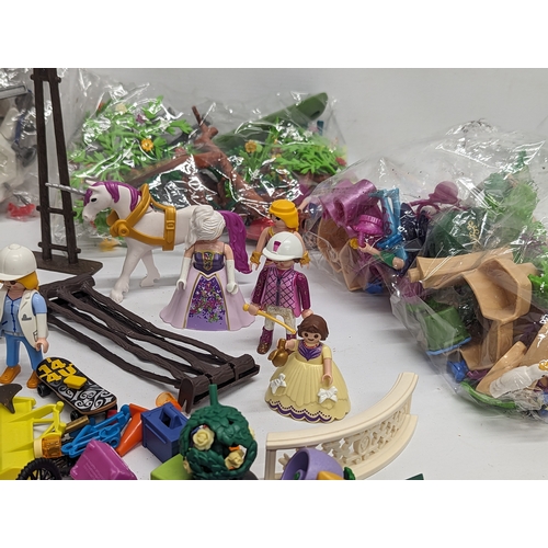 581 - A quantity of Playmobil toy figures and accessories, etc.