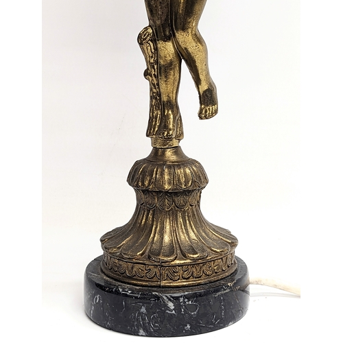 363 - A brass figure table lamp on marble base. 64cm with shade.