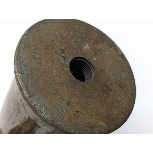 402 - A brass World War II canon shell, stamped 1940.