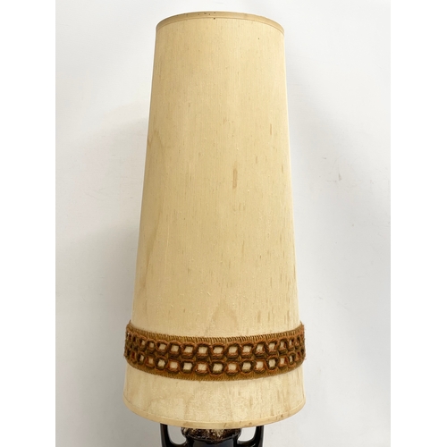 687 - A West German Mid Century lamp with original shade. 78cm