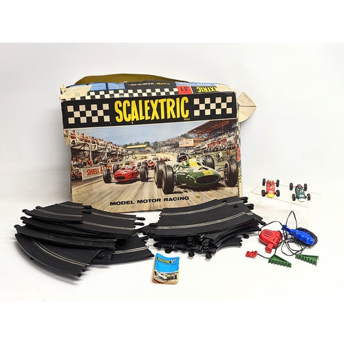 585F - A vintage Scalextric model motor racing set, by Triang.