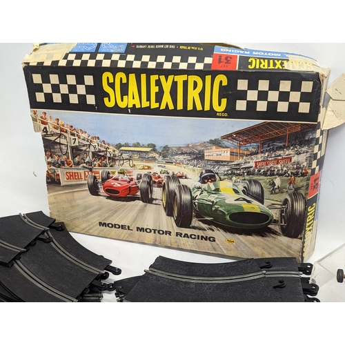 585F - A vintage Scalextric model motor racing set, by Triang.