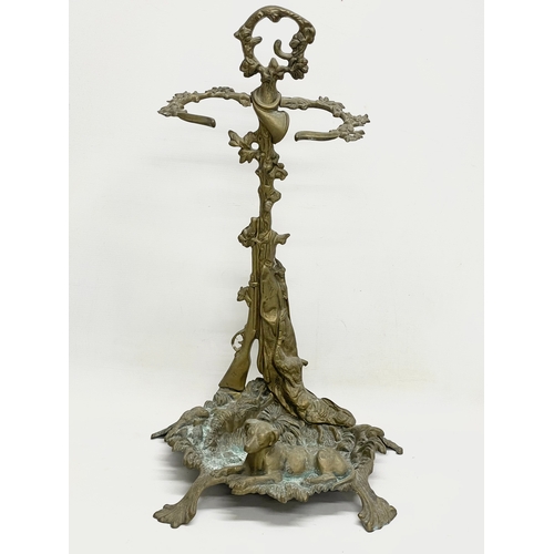 501 - A vintage ornate brass umbrella stick stand. 32x56cm