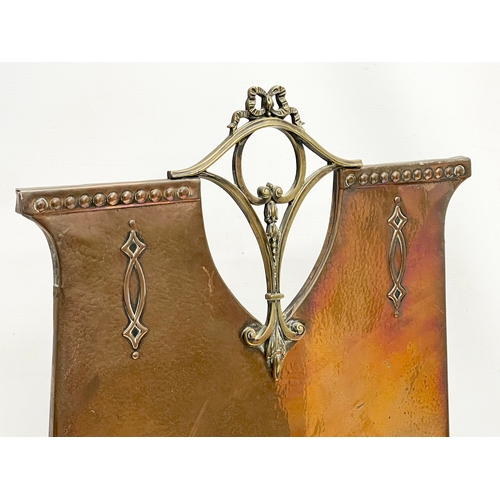 509 - A late 19th century Art Nouveau copper fire screen. 49x18x76cm