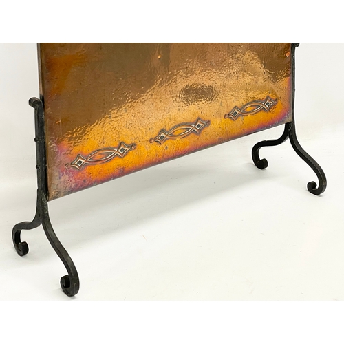 509 - A late 19th century Art Nouveau copper fire screen. 49x18x76cm