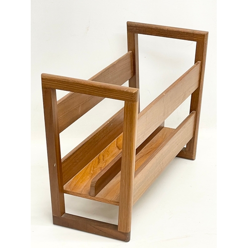 391 - A Mid Century teak magazine rack. 45x20x34cm