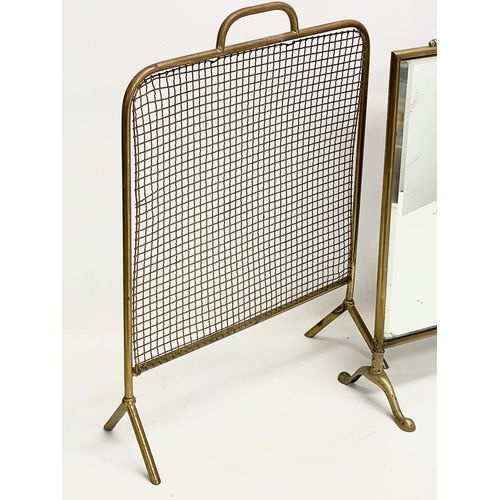 514 - 2 Edwardian brass fire screens. Mirrored screen measures 41x66cm