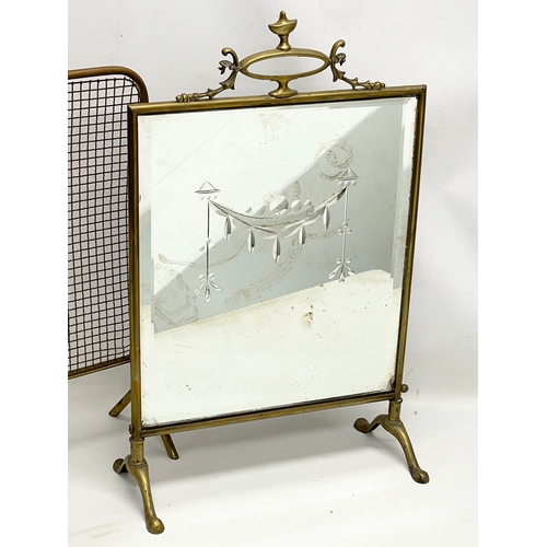 514 - 2 Edwardian brass fire screens. Mirrored screen measures 41x66cm