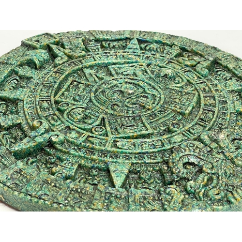 693 - A vintage Aztec calendar stone. 29.5cm