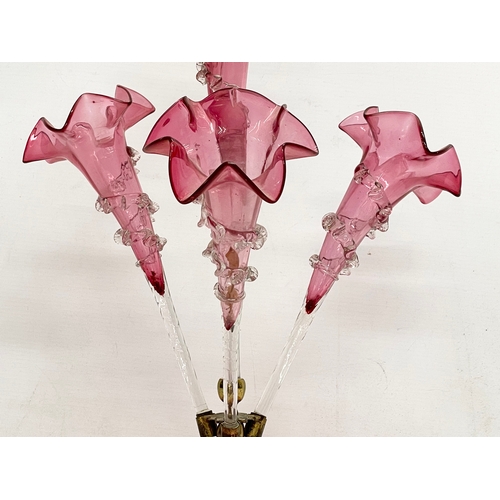 695 - A large Victorian Cranberry Glass epergne. 29x51cm